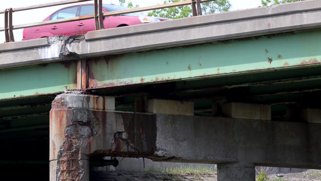 In this file photo from May 2015, concrete routinely falling from the Route 390 bridges over Trolley Boulevard.