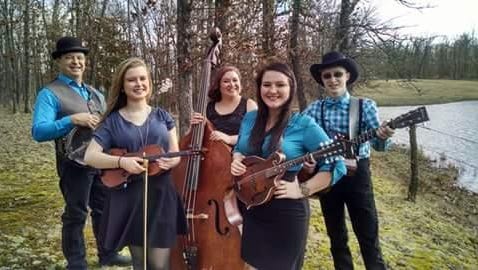 From left: Banjo player Nelson Prewitt, fiddle player Emalee Flatness, bass player Hannah Grimes, mandolin player Becca Ash,  and guitar player: Trent Prewitt form Poa Annua. They play at the first of a series of Sunday night concerts at Hillcrest Presbyterian Church this Sunday.