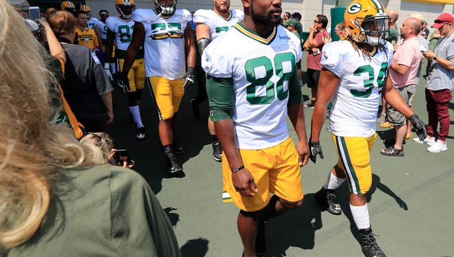 Green Bay Packers running back Ty Montgomery (88) walks on to the field for training camp practice on Tuesday, August 15, 2017 at Ray Nitschke Field.