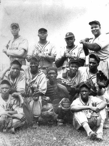 Wynder "Rocky" Simmons, of Canandaigua, second from