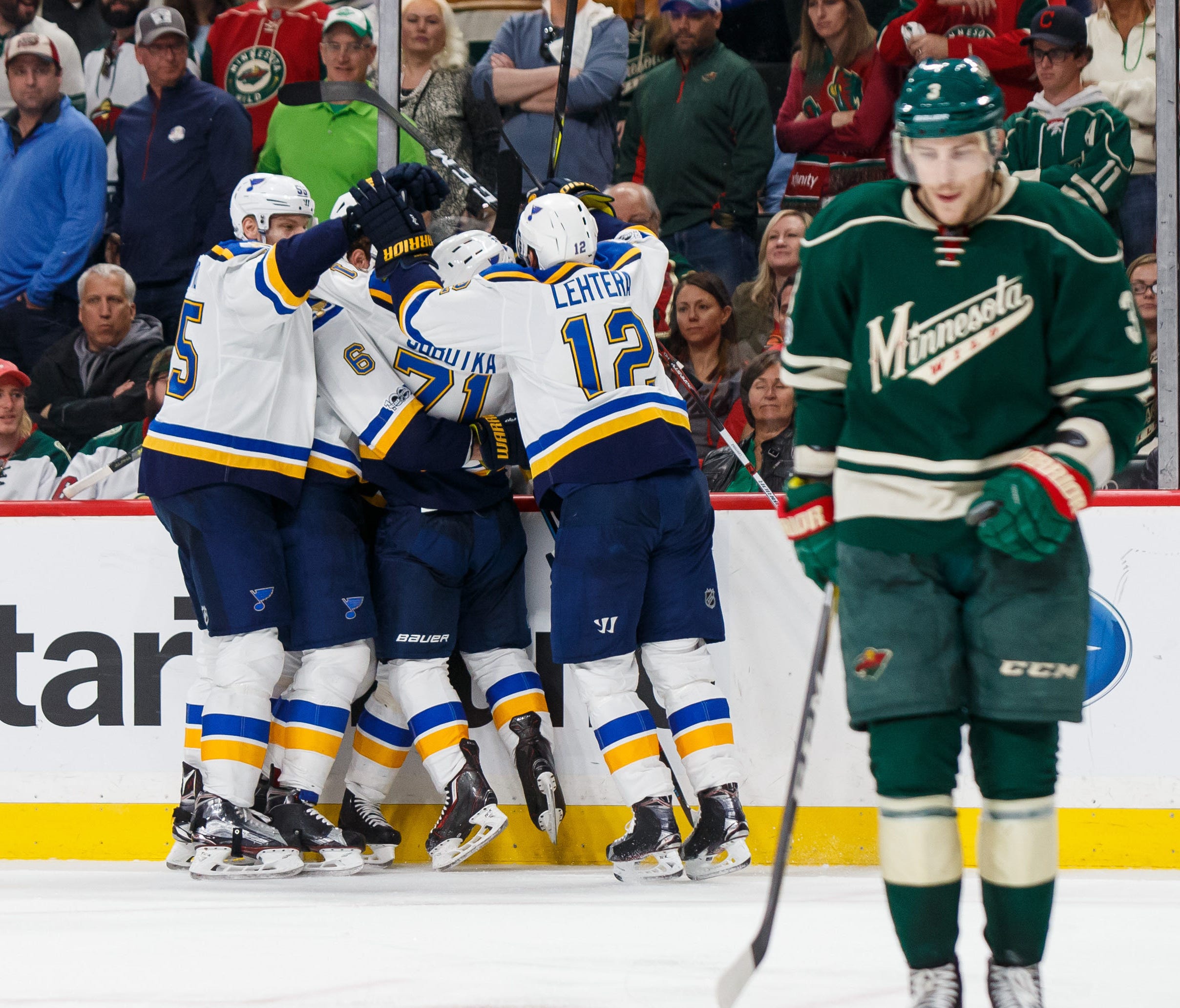St Louis Blues congratulate St Louis Blues forward Magnus Paajarvi (56) after his game-winning goal in overtime against the Minnesota Wild in Game 5. The goal sent the Blues to the second round to face the Nashville Predators.