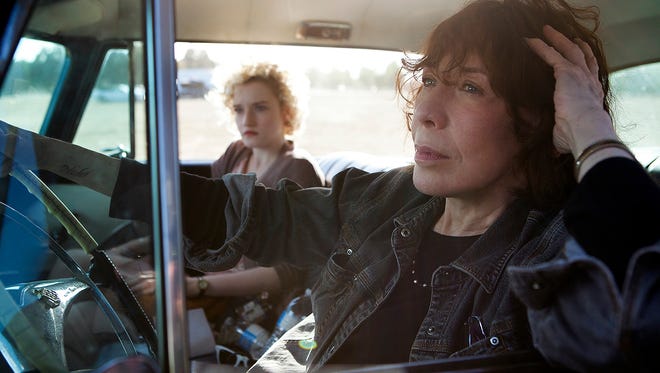 Lily Tomlin, front, and Julia Garner appear in a scene from the motion picture "Grandma."