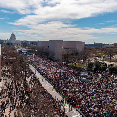 Crowds gathered in London, Paris, Los Angeles and...