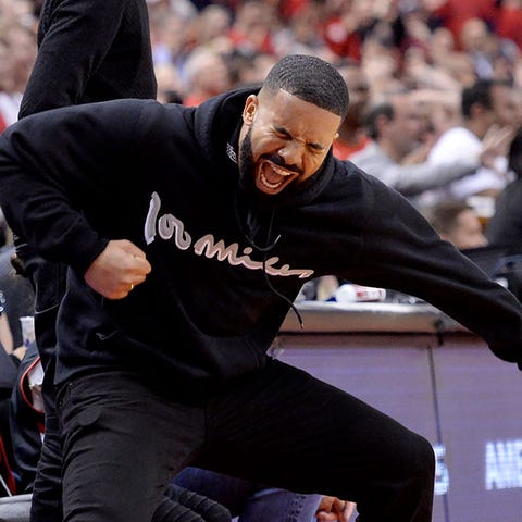 Drake gave Nick Nurse another shoulder rub during...