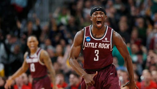 Arkansas Little Rock guard Josh Hagins reacts after hitting a 3-point basket against Purdue in the second half of a first-round men's college basketball game Thursday.