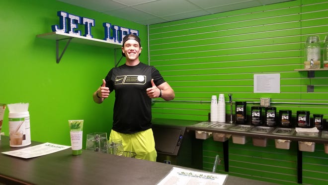 Spencer Smith of Jet Life Nutrition offers customers protein shakes and other healthy beverages.