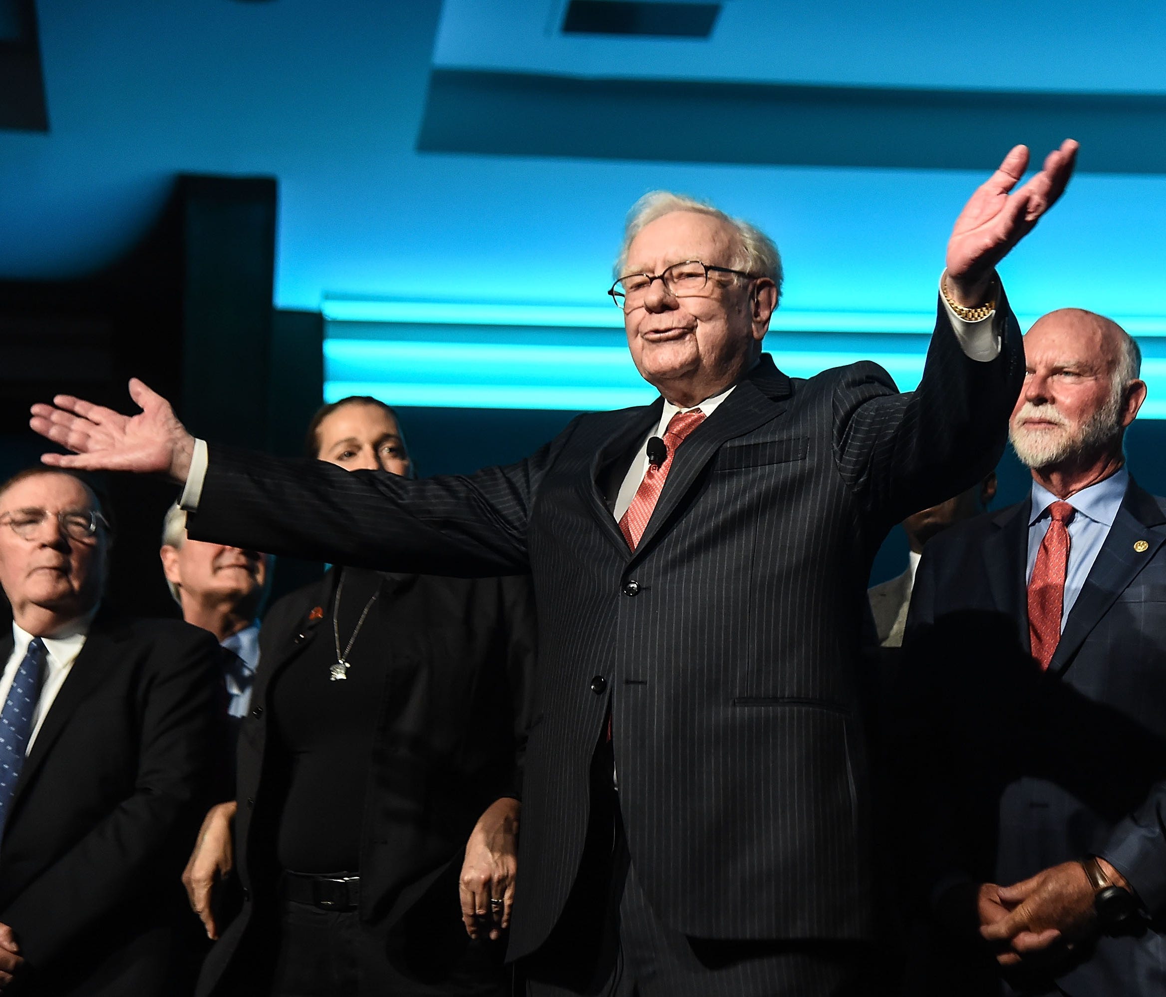 Philanthropist Warren Buffett (C) is joined onstage by 24 other philanthropist and influential business people featured on the Forbes list of 100 Greatest Business Minds during the Forbes Media Centennial Celebration at Pier 60 on September 19, 2017 