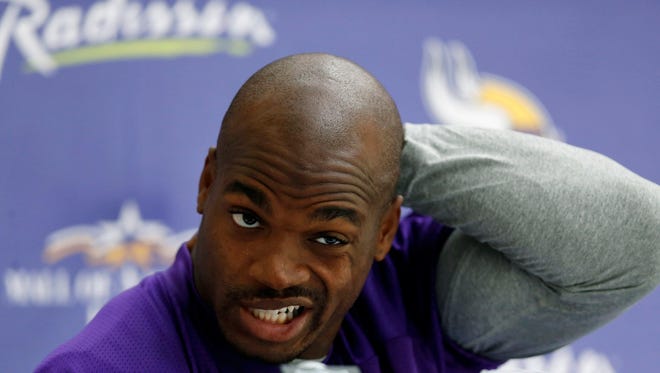 Minnesota Vikings' running back Adrian Peterson speaks to the media, during a press conference at the Grove Hotel in Watford, north London, Wednesday, Sept. 25, 2013. The Vikings play Pittsburgh Steelers on Sunday in a NFL regular season football game at Wembley Stadium in London. (AP Photo/Sang Tan)