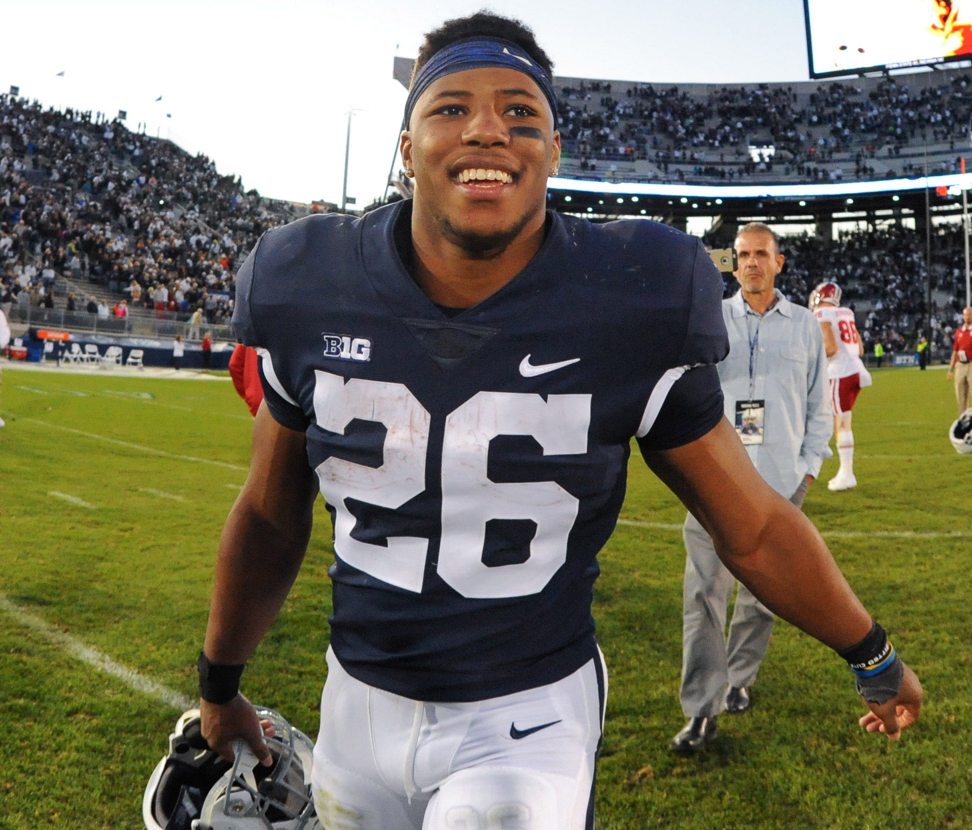 Penn State running back Saquon Barkley walks off the field after the Nittany Lions defeated Indiana at Beaver Stadium.