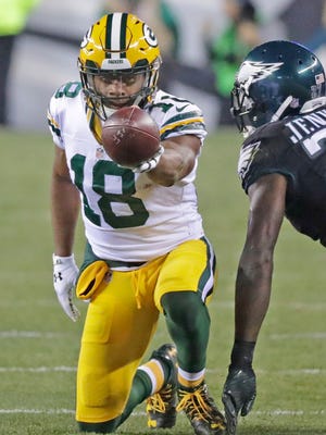 Green Bay Packers wide receiver Randall Cobb signals a first down after making a catch during Monday's game against the Philadelphia Eagles at Lincoln Financial Field in Philadelphia.
