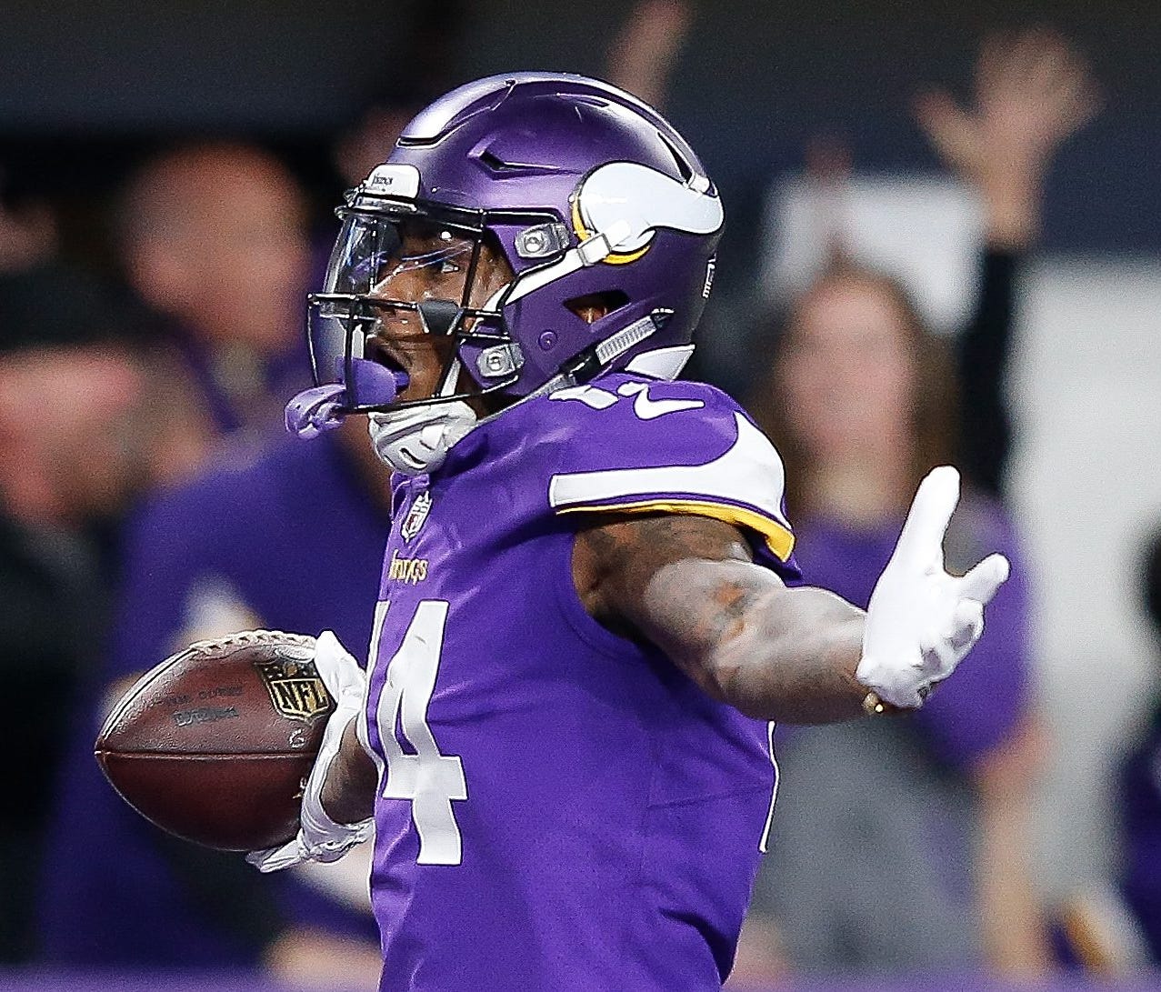MINNEAPOLIS, MN - JANUARY 14:  Stefon Diggs #14 of the Minnesota Vikings celebrates after scoring a touchdown to defeat the New Orleans Saints in the NFC Divisional Playoff game at U.S. Bank Stadium on January 14, 2018 in Minneapolis, Minnesota.  (Ph