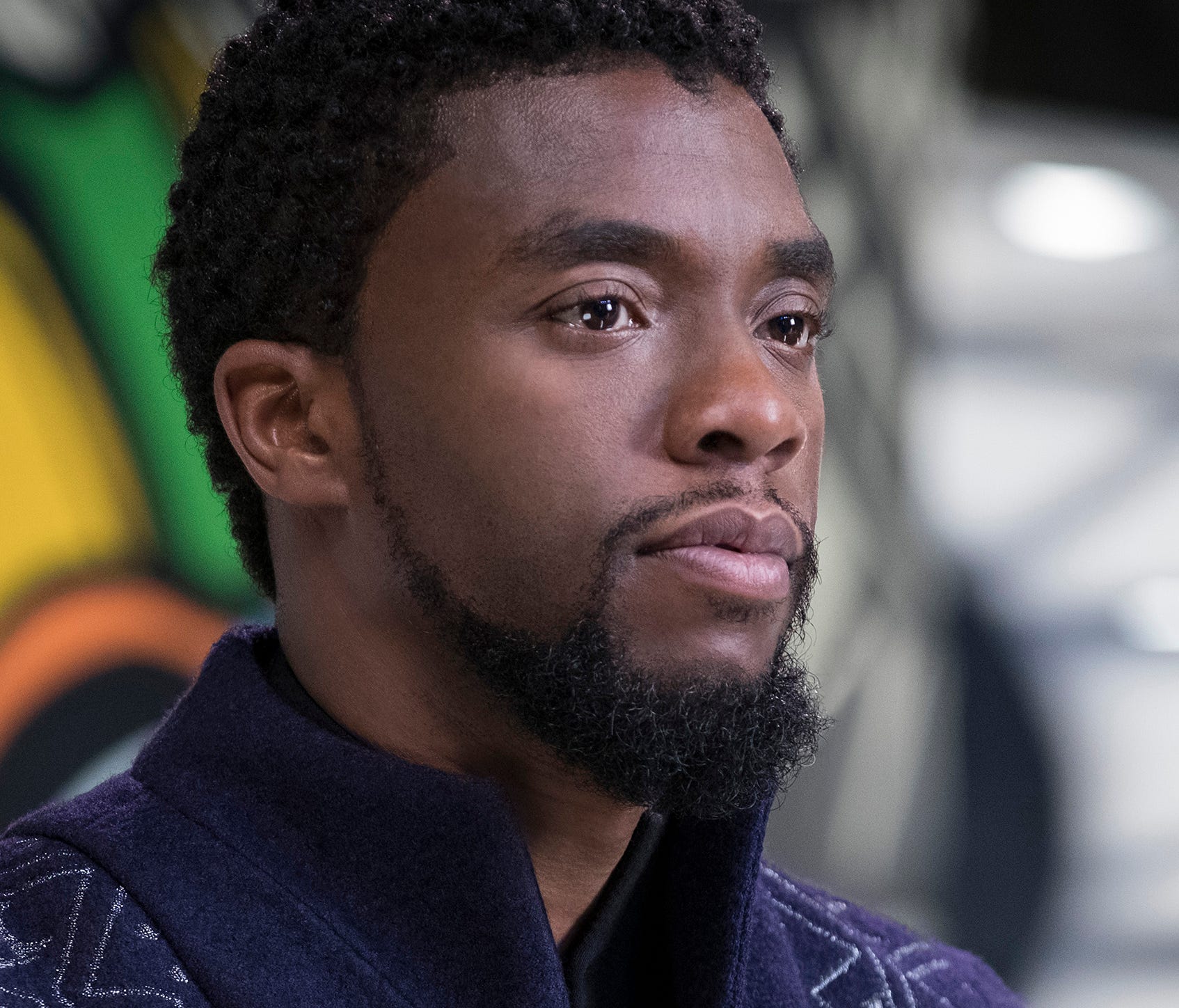 T'Challa (Chadwick Boseman) takes the throne of Wakanda in 'Black Panther.'