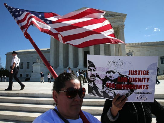 Pro-immigrationprotesters demonstrate at the Supreme