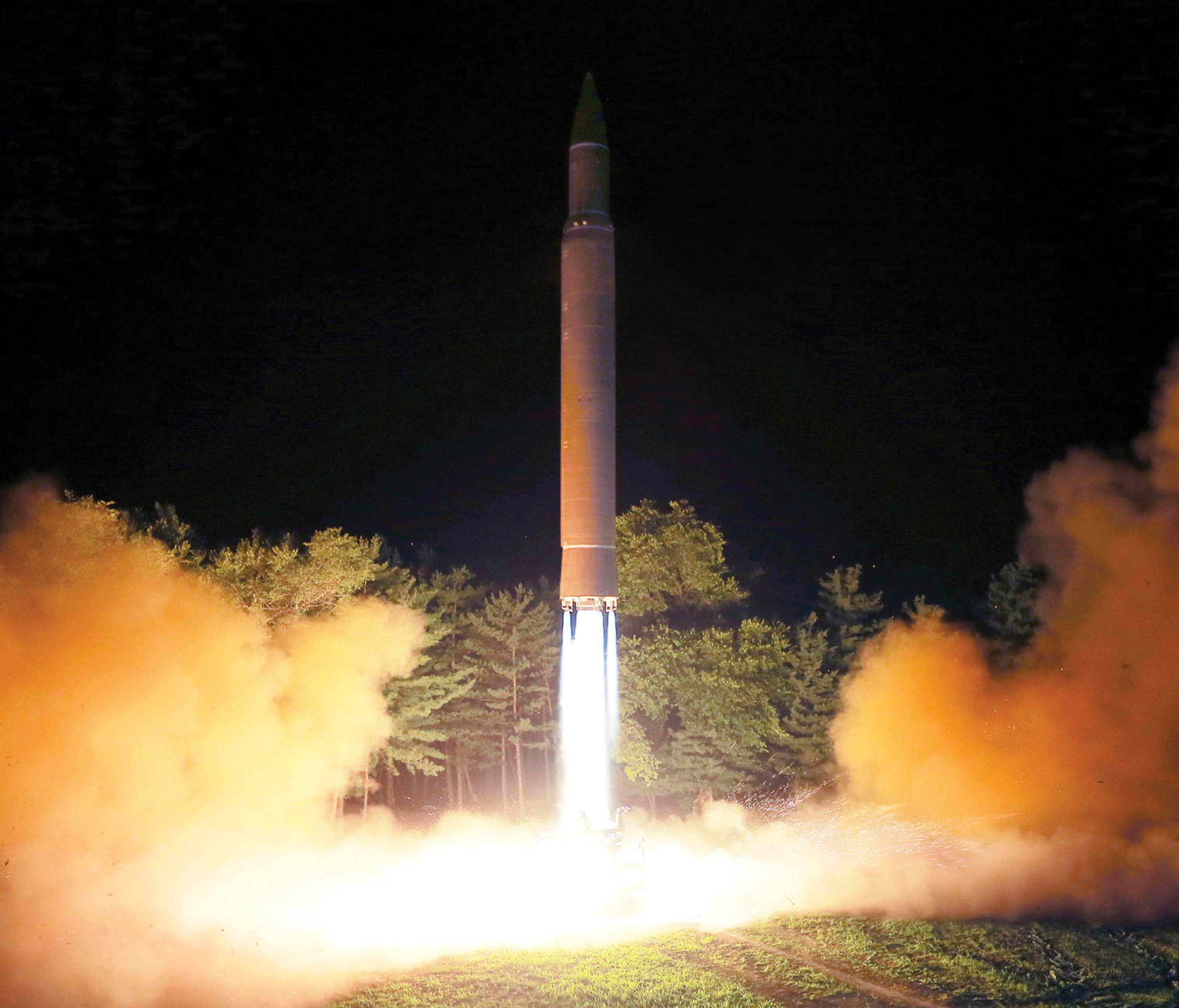 This file photo, distributed by the North Korean government, shows what was said to be the launch of a Hwasong-14 intercontinental ballistic missile at an undisclosed location in North Korea.