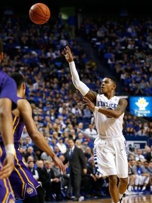 Kentucky's Tyler Ulis with the alley-hoop to Marcus Lee.  Mar. 5, 2016
