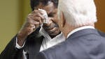 Lawrence McKinney wipes his forehead at a hearing conducted in September by the Tennessee Board of Parole.