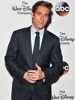 David Muir attends A Celebration of Barbara Walters Cocktail Reception Red Carpet at the Four Seasons Restaurant on May 14, 2014 in New York City.