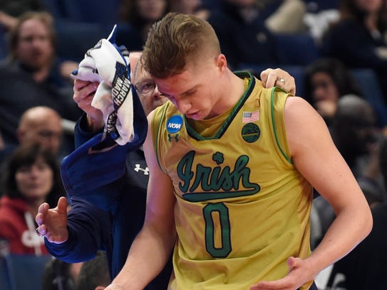 Notre Dame's Rex Pflueger suffered a cut on his head