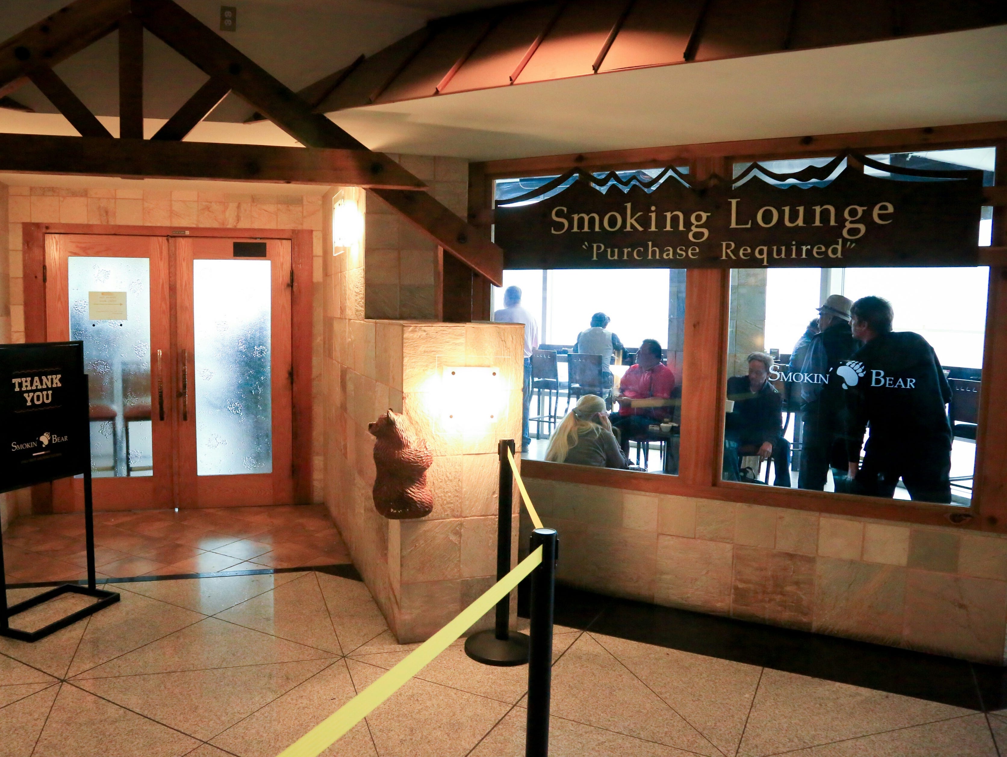 This file photo from September 2015 shows The Smokin' Bear Lodge Smoking Lounge at Denver International Airport, one of the smoking lounges that was then open at the airport.