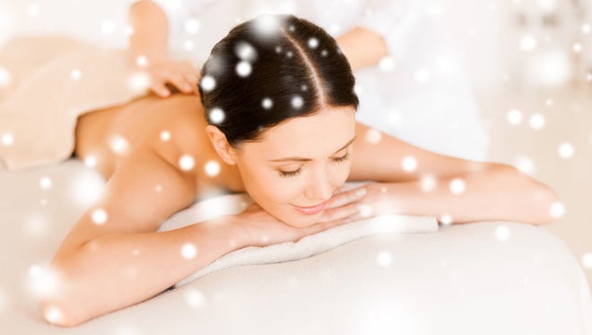 health, people, body care and beauty concept - happy woman hawing back massage in spa salon