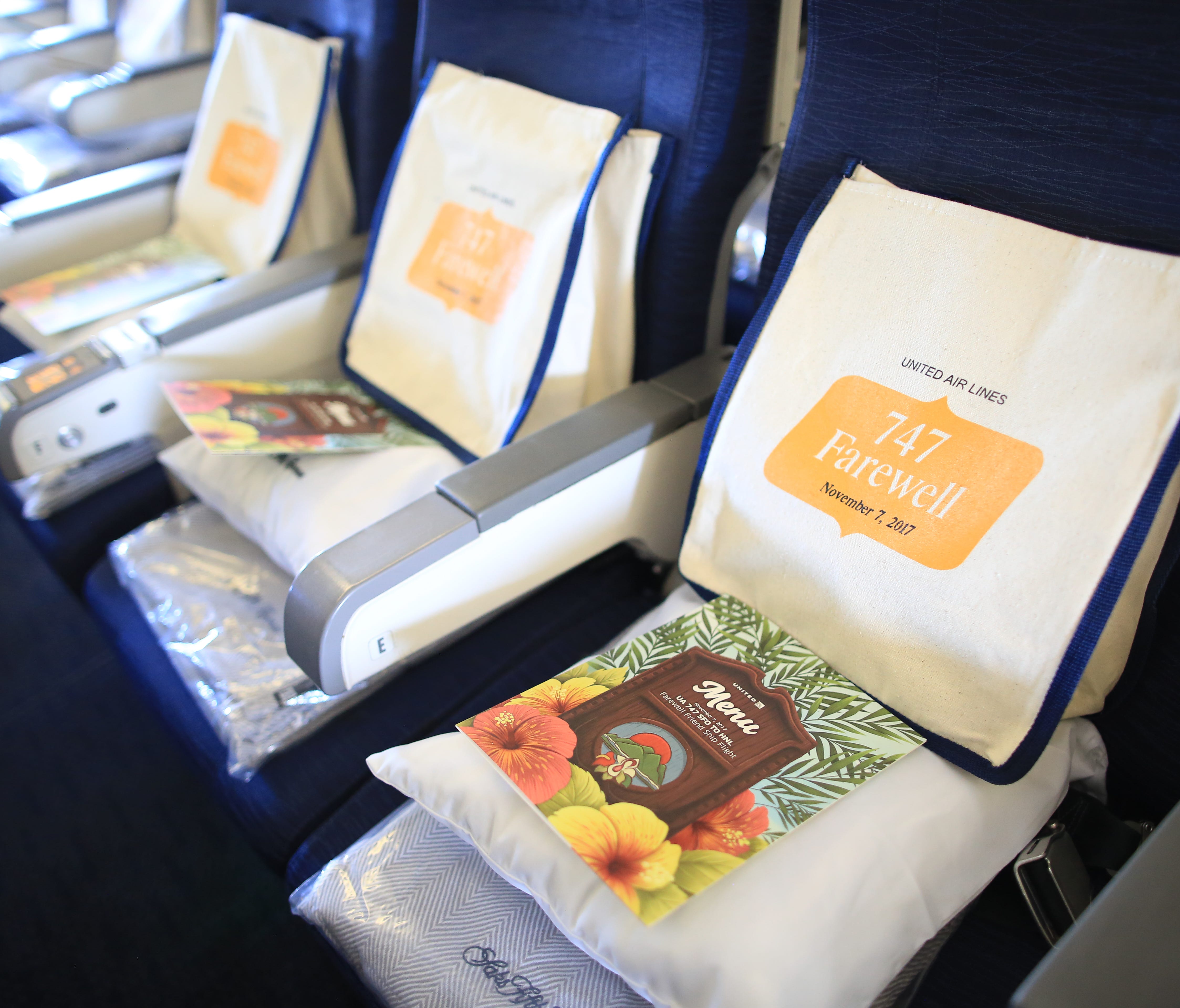 Special menus and gift bags await passengers aboard the last United Airlines Boeing 747 passenger flight on Nov. 7, 2017. The airline is retiring the jets after 47 years.