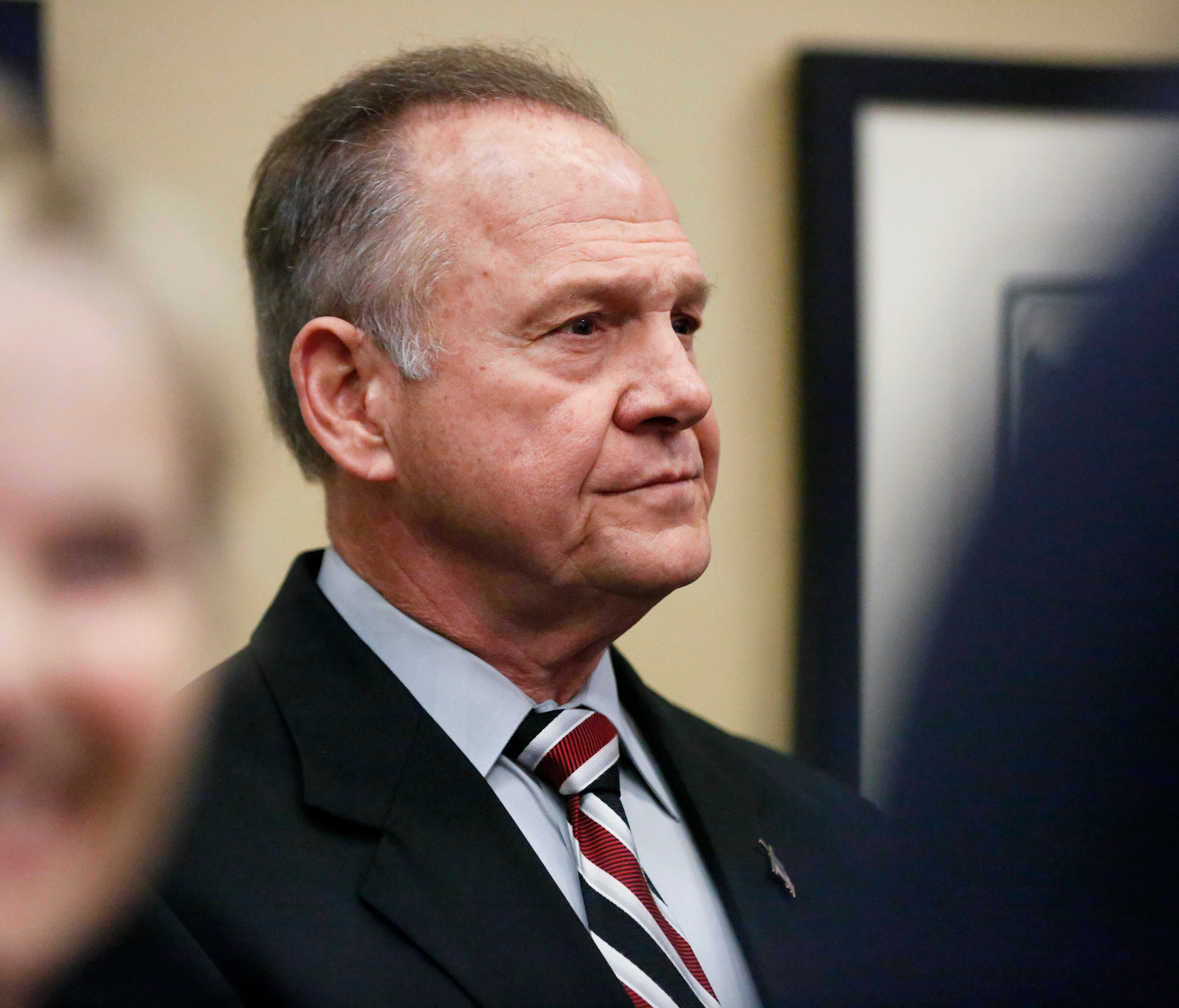 Former Alabama Chief Justice and U.S. Senate candidate Roy Moore waits to speak the Vestavia Hills Public library, Saturday, Nov. 11, 2017, in Birmingham, Ala. According to a Thursday, Nov. 9 Washington Post story an Alabama woman said Moore made ina