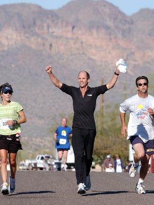 Jeff Galloway (center) is the author of "Marathon: You can Do It!"
