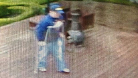 Security camera footage captures a suspect attempting to enter Kid Rock's house in Independence Township, Mich. on July 31.