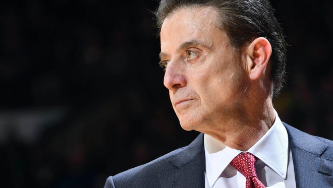 Louisville Cardinals head coach Rick Pitino watches from the bench in the first half agains the Notre Dame Fighting Irish at the Purcell Pavilion.