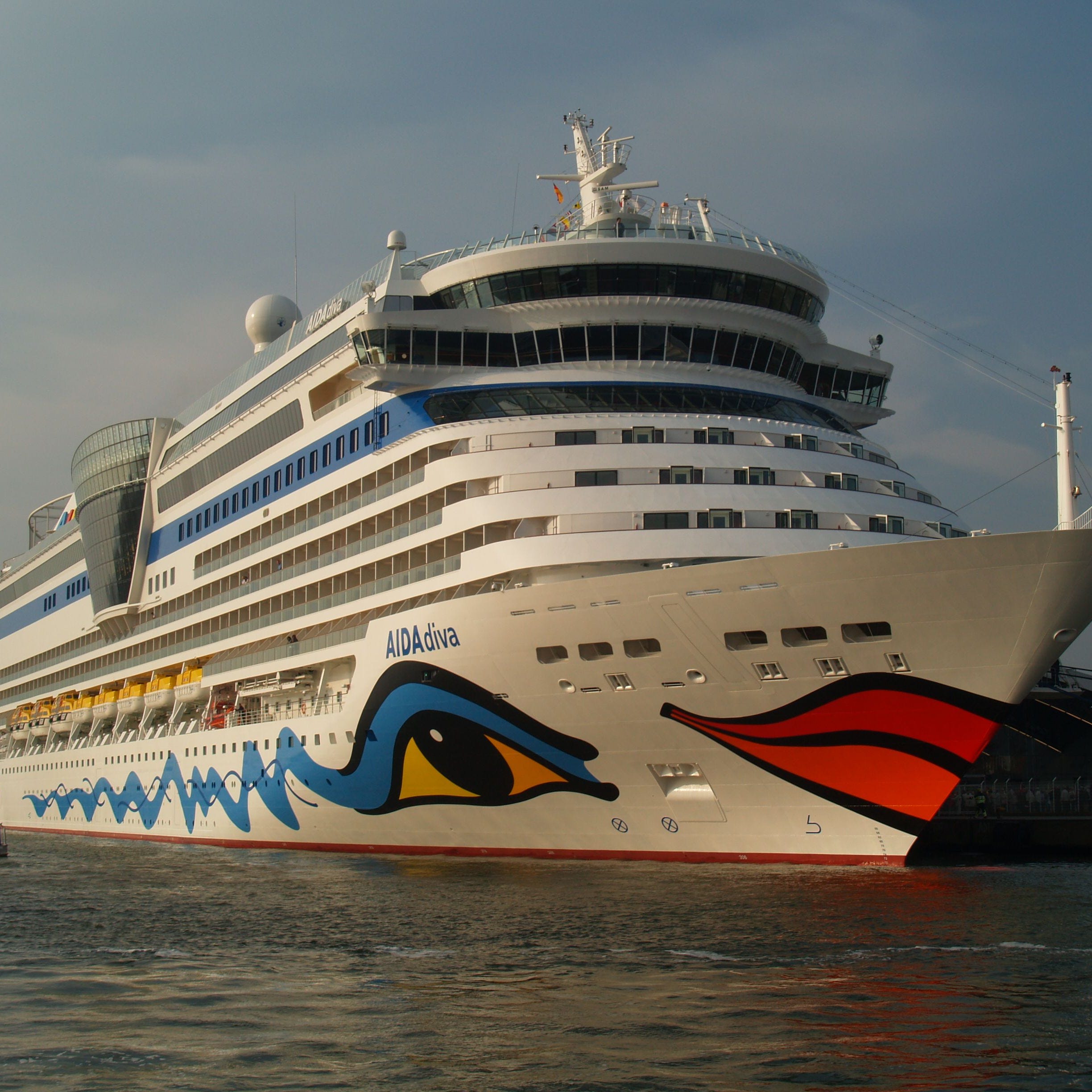 Yes, those are giant red-and-orange lips on the front of a cruise ship. German line Aida Cruises has made the multi-deck-high lips on its ship hulls a signature. Aida is credited with starting the hull art trend way back in the 1990s.