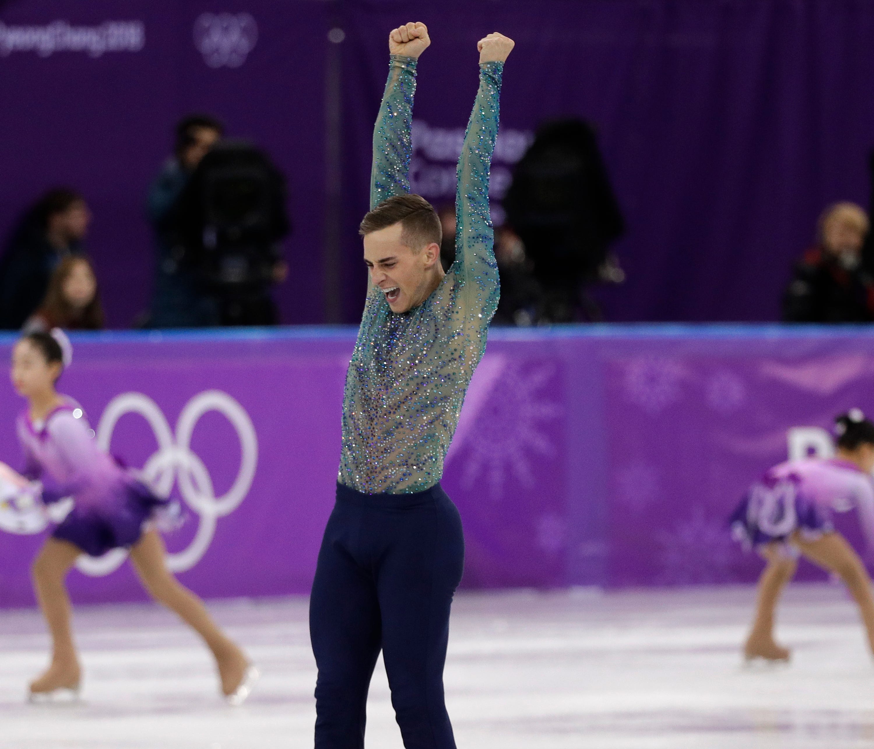 Adam Rippon of the United States reacts following his performance in the men's free figure skating final in the Gangneung Ice Arena at the 2018 Winter Olympics in Gangneung, South Korea, Saturday, Feb. 17, 2018. (AP Photo/David J. Phillip)