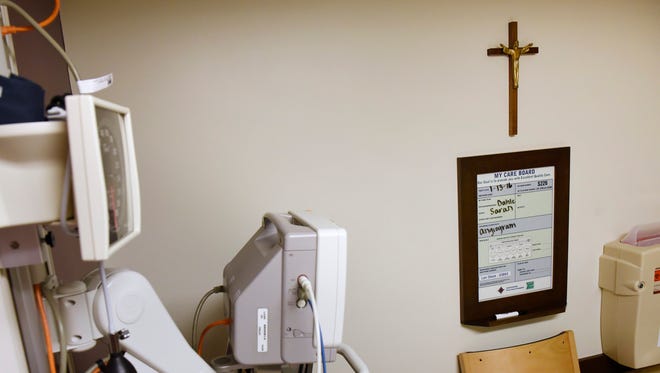 A crucifix in patient room Thursday, Jan. 14 at the St. Cloud. The St. Cloud Hospital has a policy to take down a crucifix from a patients room if requested.