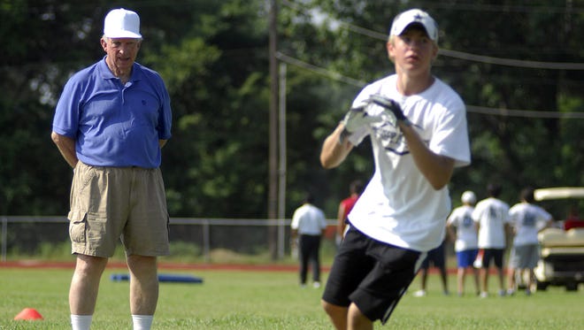 Former Mississippi State University coach Bob Tyler watches a receiver run a route in this 2010 photo.