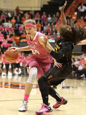 Oregon State's Sydney Wiese (24) collides with Arizona State's Elisha Davis during their game on Friday, Feb. 13 , 2015, in Corvallis, Ore.