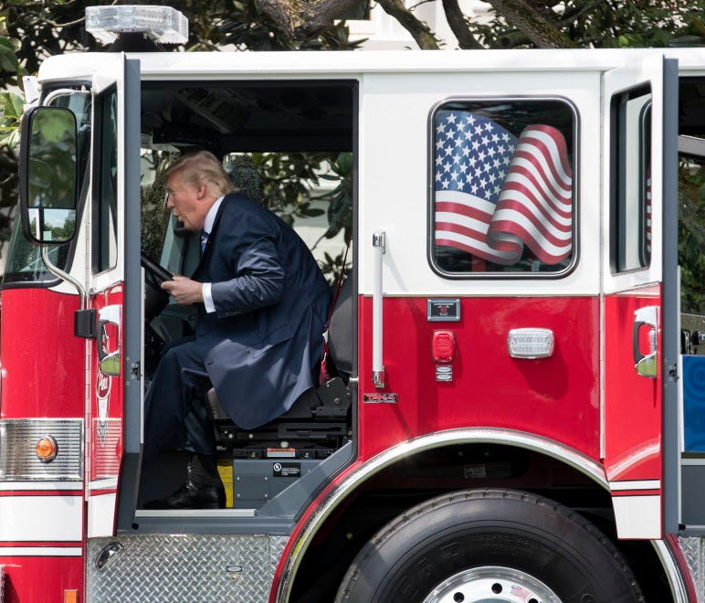 President Trump in a firetruck at the White House on July 17, 2017.