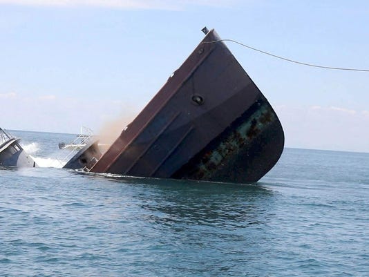 Image result for ship sinking in a storm