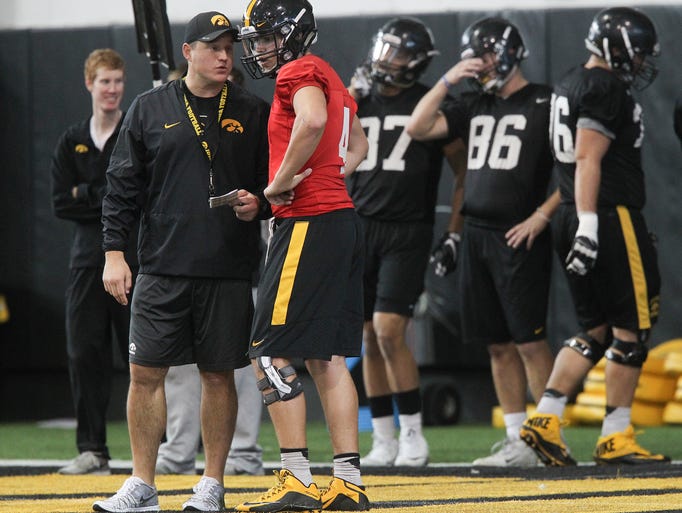 Brian Ferentz works with quarterback Nathan Stanley