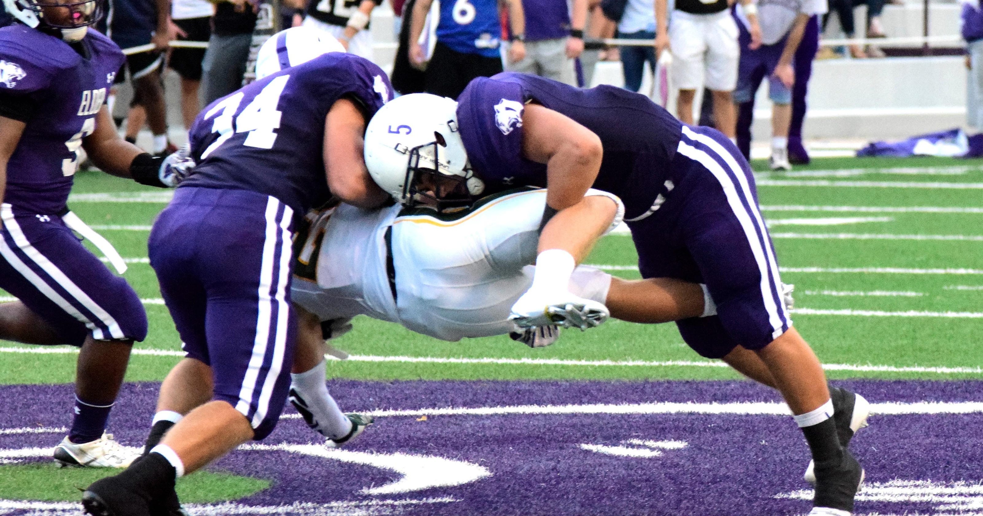 Elder football does it with defense