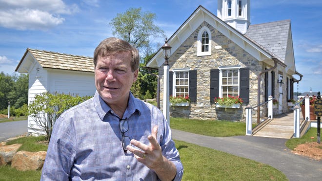 In this June 25, 2018, photo owner David Abel speaks in front of The Star Barn in Elizabethtown, Pa. A county tourism group will hold a meeting at a historic venue in Pennsylvania Dutch Country despite a recent outcry over the locale's ban on same-sex weddings. The policy at The Star Barn, a top wedding spot in Elizabethtown that is surrounded by farmland, orchards and vineyards in scenic Lancaster County, drew the attention last month of a retired teacher who was attending an event there. (Dan Marschka/LNP/LancasterOnline via AP)