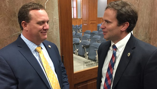State Representative Tanner Magee, R-Houma (right), speaks to Kenny Havard, R-Jackson, in 2017.
