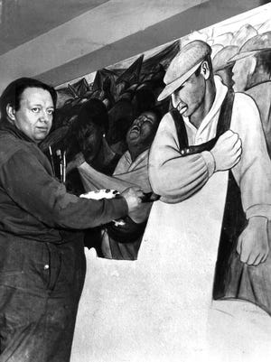 Muralist Diego Rivera at work on a section of the Detroit Institute of Arts murals in 1931. Rivera found his theme prowling the city, visiting the neighborhoods where the workers lived, areas heavily populated with ethnic groups who toiled in nearby factories.