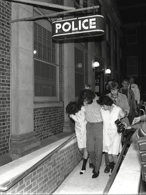 From left, Brinks robbery suspects Kathy Boudin, David Gilbert and Judith Clark are leaving from Nyack police headquarters after their October 1981 arraignment on felony murder charges. Two Nyack police officers and a Brinks guard were killed.
