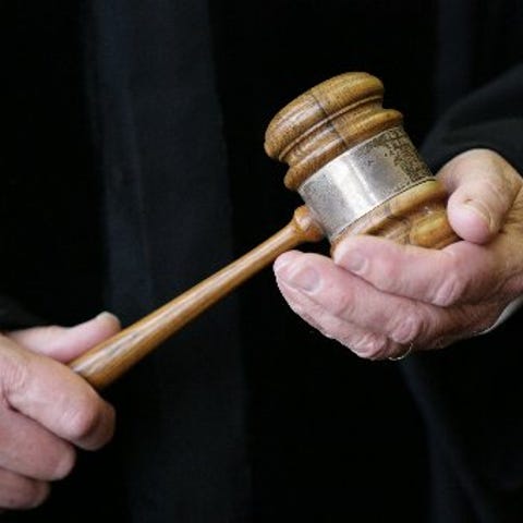 A lobbyist for Michigan auto dealers must turn ove