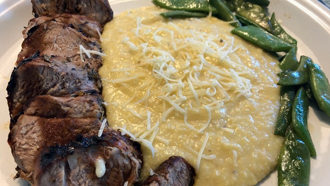 Creamy polenta served with Broiled Pork Tenderloin marinated in white wine, lime juice, garlic and rosemary and sauteed Italian flat green beans