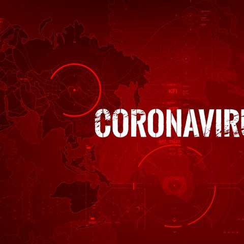 Coronavirus sign against map background.