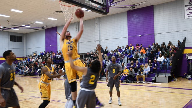 LSUA center Gilbert Talbot goes for the layup against Paul Quinn Colege. The Generals won 84-62.