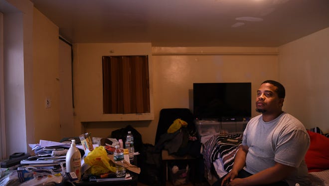 Karream Sheard was a fixer for one of the biggest drug cartels in America. After time in prison, he now lives in Paterson and is trying to put his life together by studying engineering. Sheard is seen here in his basement apartment in Paterson this month.