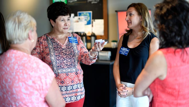 Wyckoff Township Committee candidates Carla Pappalardo, second from left, and Melissa Rubenstein, third from left, talk to voters in the Wyckoff Starbucks on Sept. 19. Rubenstein and Pappalardo are running with Brian Scanlan for election on Nov. 7.