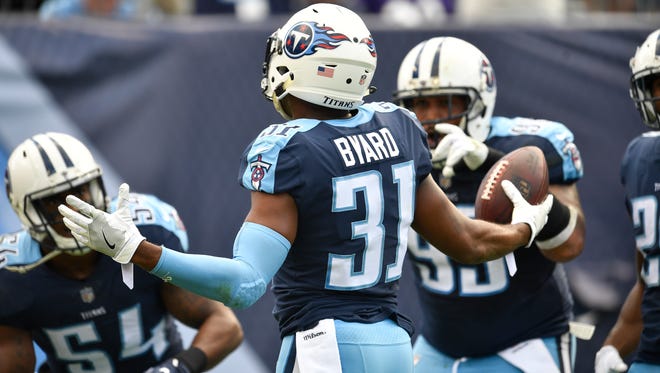 Titans safety Kevin Byard celebrates an interception in the first half Sunday.
