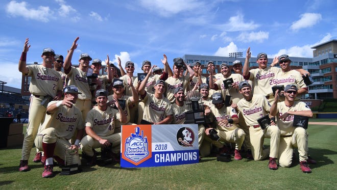 The Florida State Baseball team celebrates winning the ACC Championship with a 11-8 ten inning victory over Louisville in Durham, North Carolina.